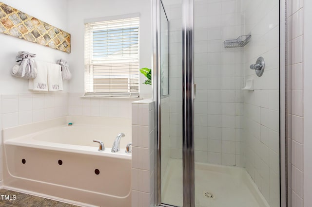 320 Gilman Ln Unit 106, Raleigh, NC 27610 - full bathroom featuring a stall shower and a bath