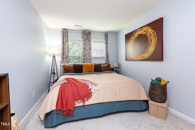 320 Gilman Ln Unit 106, Raleigh, NC 27610 - bedroom with carpet floors and baseboards