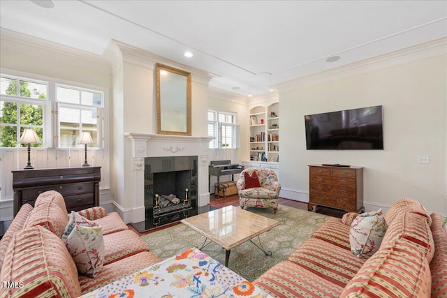 1313 Duplin Rd, Raleigh, NC 27607 - living room with crown molding, a high end fireplace, wood finished floors, built in features, and recessed lighting