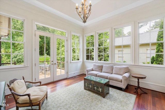 1313 Duplin Rd, Raleigh, NC 27607 - sunroom with french doors, a chandelier, and wood finished floors