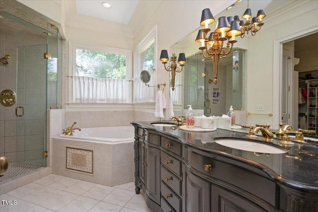 1313 Duplin Rd, Raleigh, NC 27607 - bathroom with a garden tub, a shower stall, double vanity, a chandelier, and crown molding
