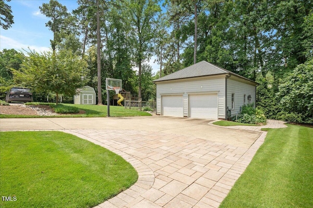 1313 Duplin Rd, Raleigh, NC 27607 - garage featuring a storage shed