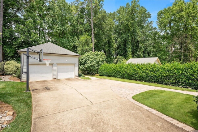 1313 Duplin Rd, Raleigh, NC 27607 - garage featuring concrete driveway