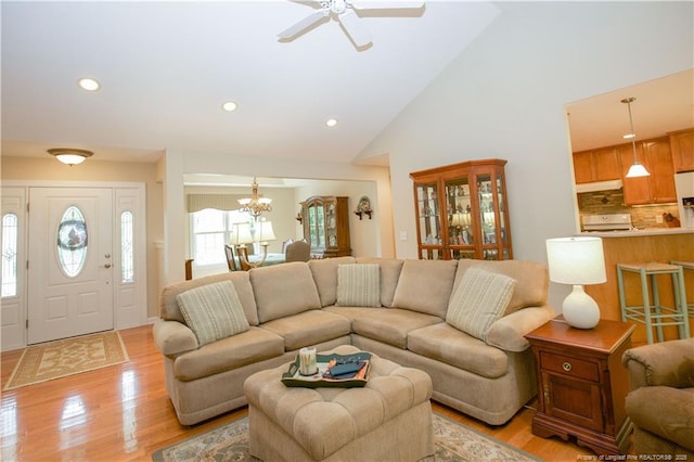 957 Blackeyed Susan Pl, Vass, NC 28394 - living area with a chandelier, light wood finished floors, a ceiling fan, recessed lighting, and high vaulted ceiling