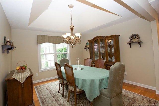 957 Blackeyed Susan Pl, Vass, NC 28394 - dining room with a chandelier and light wood finished floors