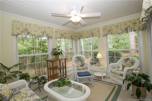 957 Blackeyed Susan Pl, Vass, NC 28394 - sunroom featuring a ceiling fan, tile patterned floors, healthy amount of natural light, and crown molding