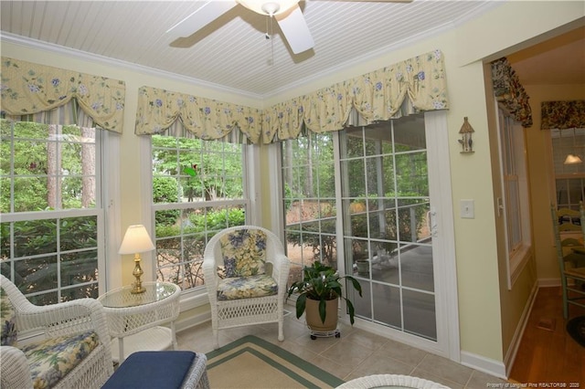 957 Blackeyed Susan Pl, Vass, NC 28394 - sunroom with a ceiling fan, plenty of natural light, crown molding, and tile patterned flooring