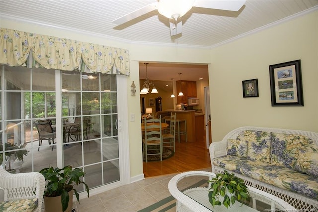 957 Blackeyed Susan Pl, Vass, NC 28394 - tiled living area featuring a ceiling fan and ornamental molding