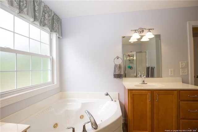 957 Blackeyed Susan Pl, Vass, NC 28394 - full bath with vanity, a stall shower, and a whirlpool tub