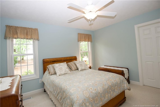 957 Blackeyed Susan Pl, Vass, NC 28394 - carpeted bedroom with baseboards and ceiling fan