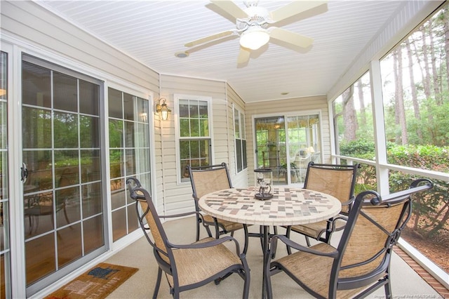 957 Blackeyed Susan Pl, Vass, NC 28394 - sunroom / solarium with ceiling fan and outdoor dining space