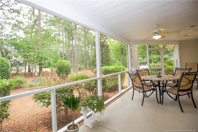 957 Blackeyed Susan Pl, Vass, NC 28394 - sunroom with ceiling fan and outdoor dining area