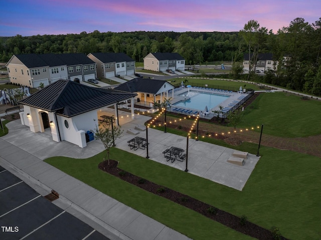 272 Meadowbark Bnd Unit 41, Garner, NC 27529 - aerial view at dusk of view of pool area and a forest view