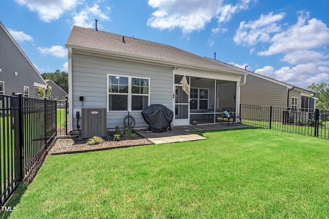 1247 White Flint Cir, Durham, NC 27703 - rear view of house with a fenced backyard, a sunroom, and a patio