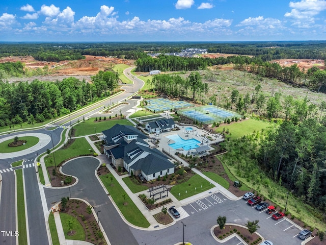 1247 White Flint Cir, Durham, NC 27703 - bird's eye view of a pool and a heavily wooded area
