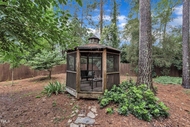 7917 Featherstone Dr, Raleigh, NC 27615 - view of outdoor structure featuring a gazebo and a fenced backyard