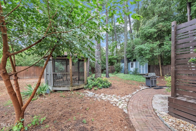 7917 Featherstone Dr, Raleigh, NC 27615 - fenced backyard featuring a shed
