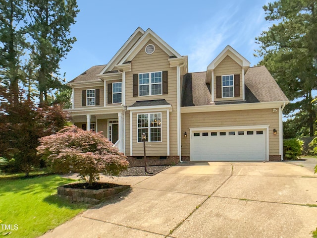 1201 Dagmar Ln, Wake Forest, NC 27587 - view of front of property featuring driveway, a garage, a front lawn, a shingled roof, and crawl space