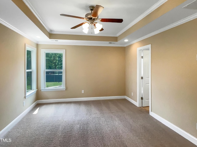 1201 Dagmar Ln, Wake Forest, NC 27587 - carpeted spare room with a tray ceiling, ornamental molding, ceiling fan, and recessed lighting