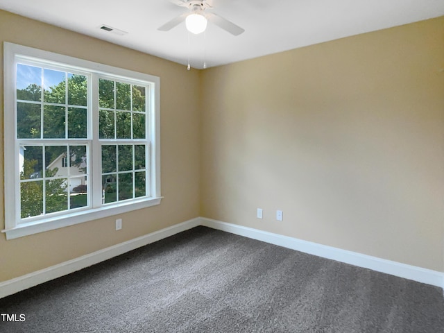 1201 Dagmar Ln, Wake Forest, NC 27587 - spare room featuring dark colored carpet and a ceiling fan