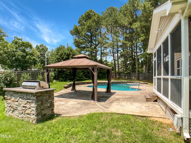 1201 Dagmar Ln, Wake Forest, NC 27587 - view of swimming pool featuring a gazebo, a fenced backyard, a patio area, a sunroom, and area for grilling