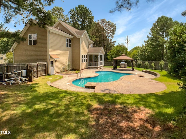 1201 Dagmar Ln, Wake Forest, NC 27587 - view of swimming pool featuring a gazebo, a sunroom, a patio area, and a fenced backyard