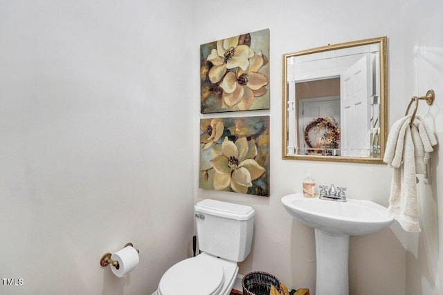116 Twin Oaks Pl, Goldsboro, NC 27530 - half bathroom featuring toilet and a sink