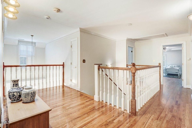 116 Twin Oaks Pl, Goldsboro, NC 27530 - corridor with attic access, an upstairs landing, wood finished floors, and ornamental molding