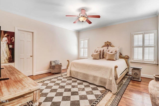 116 Twin Oaks Pl, Goldsboro, NC 27530 - bedroom featuring light wood-type flooring, crown molding, and ceiling fan