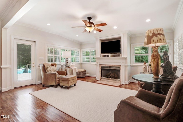 116 Twin Oaks Pl, Goldsboro, NC 27530 - living area with wood finished floors, plenty of natural light, a ceiling fan, ornamental molding, and recessed lighting
