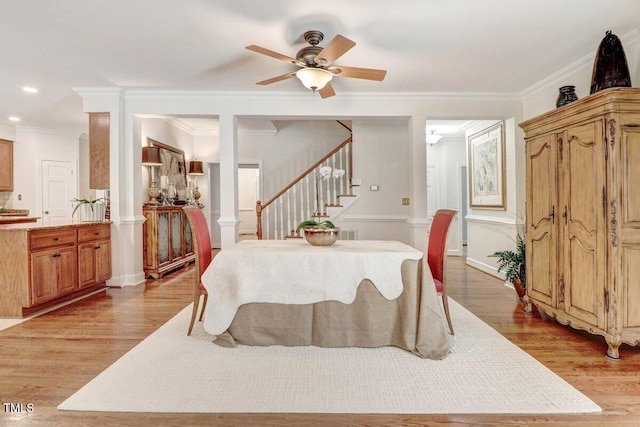 116 Twin Oaks Pl, Goldsboro, NC 27530 - dining room featuring ceiling fan, crown molding, stairs, light wood-style floors, and recessed lighting