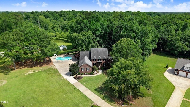 116 Twin Oaks Pl, Goldsboro, NC 27530 - view from above of property with a heavily wooded area and a pool area