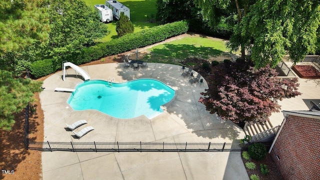 116 Twin Oaks Pl, Goldsboro, NC 27530 - view of swimming pool featuring a water slide, a patio area, and a diving board