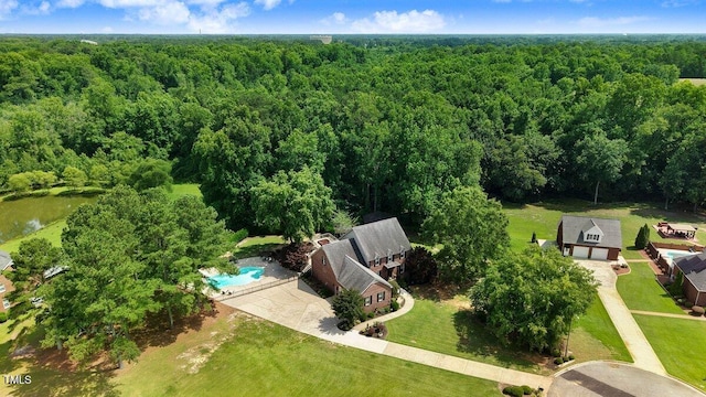 116 Twin Oaks Pl, Goldsboro, NC 27530 - drone / aerial view of a heavily wooded area and a pool