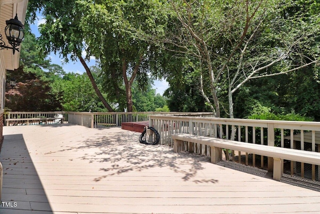 116 Twin Oaks Pl, Goldsboro, NC 27530 - wooden terrace with view of wooded area
