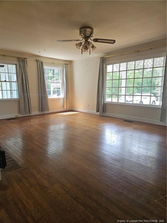 2943 Ole Bluff Mill Rd, Fayetteville, NC 28306 - spare room featuring wood finished floors and a ceiling fan