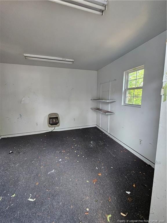 2943 Ole Bluff Mill Rd, Fayetteville, NC 28306 - empty room with baseboards and heating unit