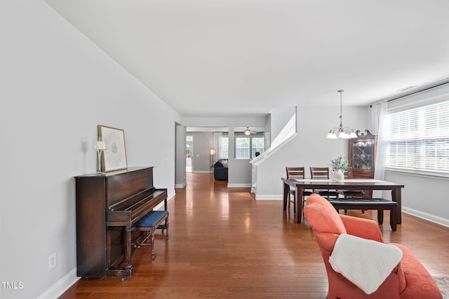 200 Woodvale Way, Fuquay Varina, NC 27526 - living area with a chandelier, plenty of natural light, and dark wood-style floors