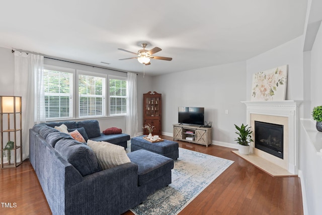 200 Woodvale Way, Fuquay Varina, NC 27526 - living room featuring ceiling fan, dark wood finished floors, and a fireplace with flush hearth