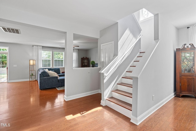 200 Woodvale Way, Fuquay Varina, NC 27526 - stairway featuring wood finished floors and plenty of natural light
