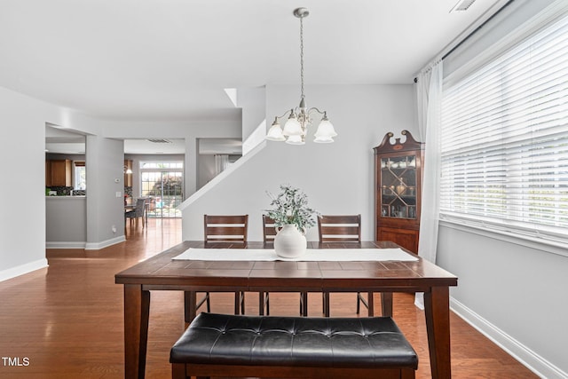 200 Woodvale Way, Fuquay Varina, NC 27526 - dining room featuring a chandelier and wood finished floors