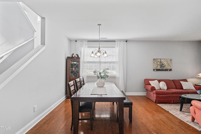200 Woodvale Way, Fuquay Varina, NC 27526 - dining room featuring dark wood finished floors and a chandelier