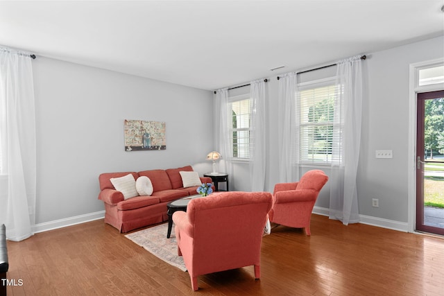 200 Woodvale Way, Fuquay Varina, NC 27526 - living room featuring hardwood / wood-style floors and baseboards