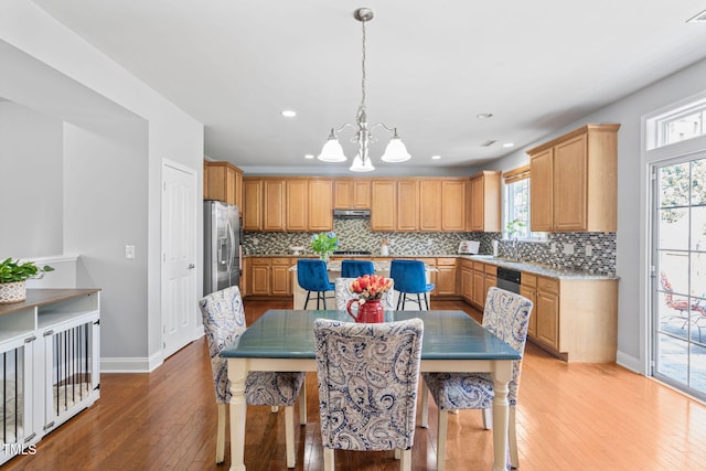 200 Woodvale Way, Fuquay Varina, NC 27526 - dining room with a chandelier, light wood-style floors, plenty of natural light, and recessed lighting