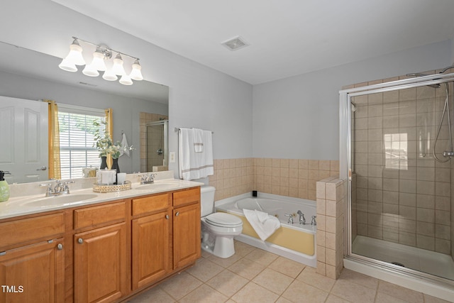 200 Woodvale Way, Fuquay Varina, NC 27526 - full bath with tile patterned floors, a shower stall, a bath, and double vanity