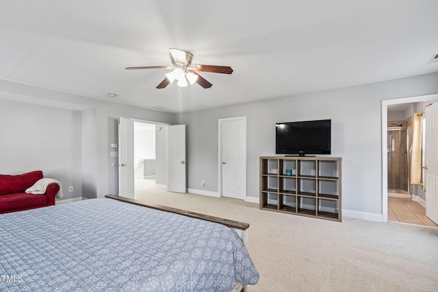 200 Woodvale Way, Fuquay Varina, NC 27526 - carpeted bedroom featuring a ceiling fan and ensuite bathroom