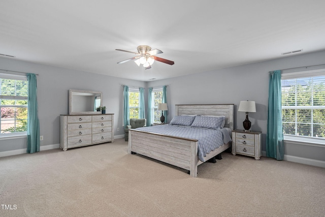 200 Woodvale Way, Fuquay Varina, NC 27526 - carpeted bedroom featuring baseboards and ceiling fan