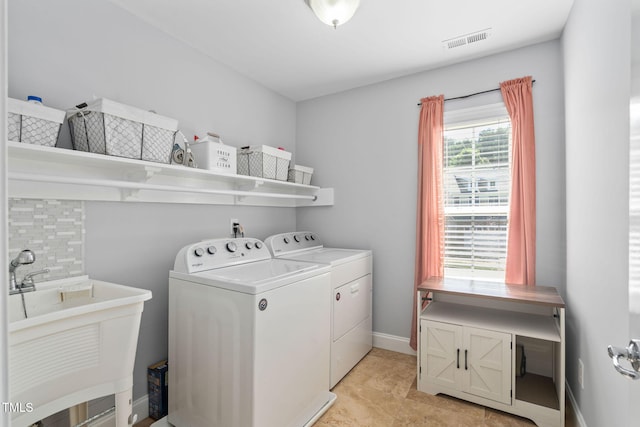 200 Woodvale Way, Fuquay Varina, NC 27526 - washroom with washing machine and clothes dryer and baseboards