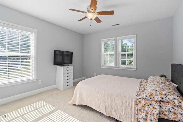 200 Woodvale Way, Fuquay Varina, NC 27526 - carpeted bedroom featuring baseboards and ceiling fan