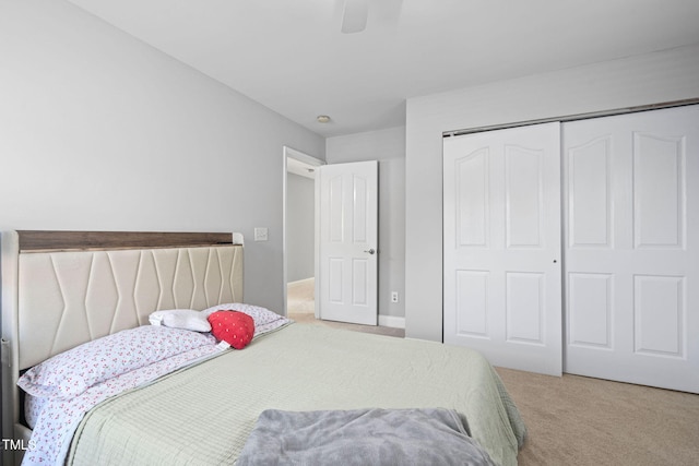 200 Woodvale Way, Fuquay Varina, NC 27526 - carpeted bedroom featuring a closet and a ceiling fan